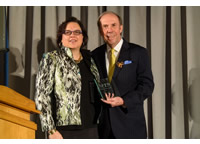 Deborah Acklin, President and CEO of WQED Multimedia and Pat Butler, President and CEO of APTS, pose with award