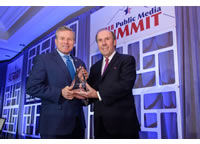 Congressman Charles W. Dent and Pat Butler, President and CEO of APTS, pose with award